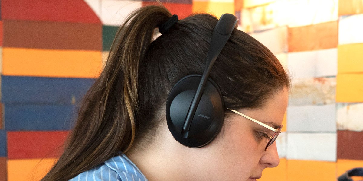 Person wearing Bose QuietComfort Ultra Headphones