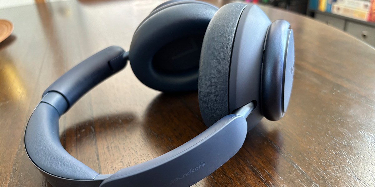 Soundcore Space Q45 on dark wood table Soundcore Space Q45 on dark wood table