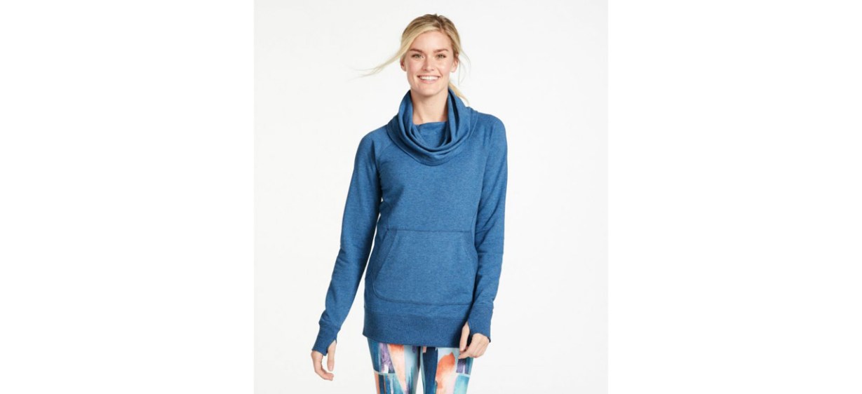 Woman wearing blue Cozy Pullover on white background Woman wearing blue Cozy Pullover on white background
