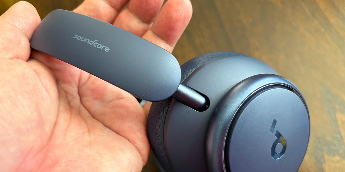 Hand holding Soundcore Space Q45 Hand holding Soundcore Space Q45