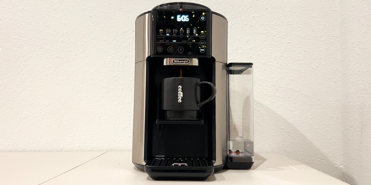 De'Longhi TrueBrew Drip Coffee Maker with coffee cup on kitchen counter De'Longhi TrueBrew Drip Coffee Maker with coffee cup on kitchen counter