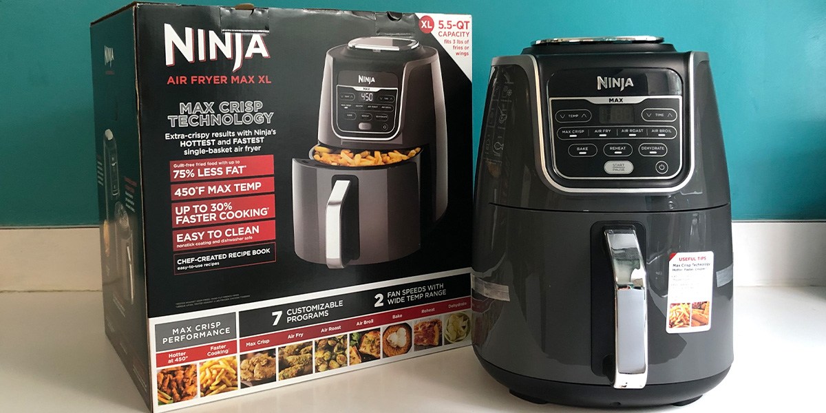 Ninja Air Fryer Max XL next to branded product packaging