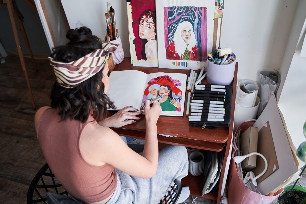 a person using paint pens