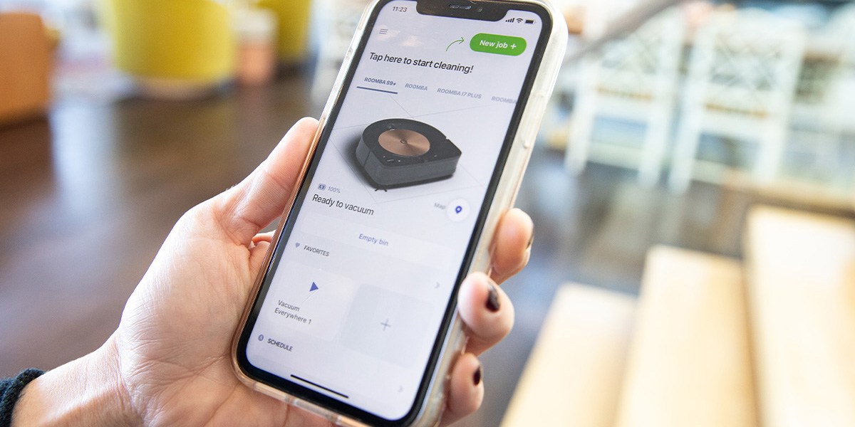 Person using iRobot app  Person using iRobot app