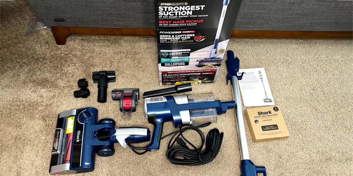 Stratos UltraLight with accessories and product package displayed on floor Stratos UltraLight with accessories and product package displayed on floor