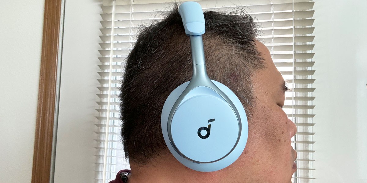 Side view of person wearing Soundcore Space Ones Side view of person wearing Soundcore Space Ones