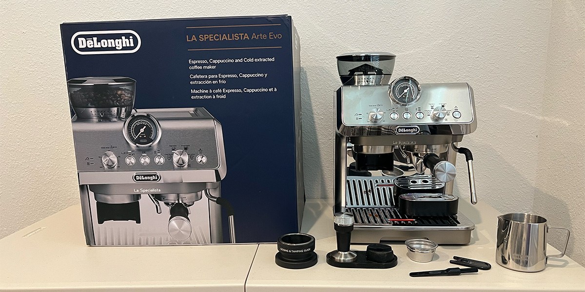De’Longhi La Specialista Arte Evo on kitchen counter next to product packaging De’Longhi La Specialista Arte Evo on kitchen counter next to product packaging