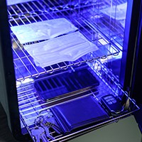 a phone inside a uv sanitizer