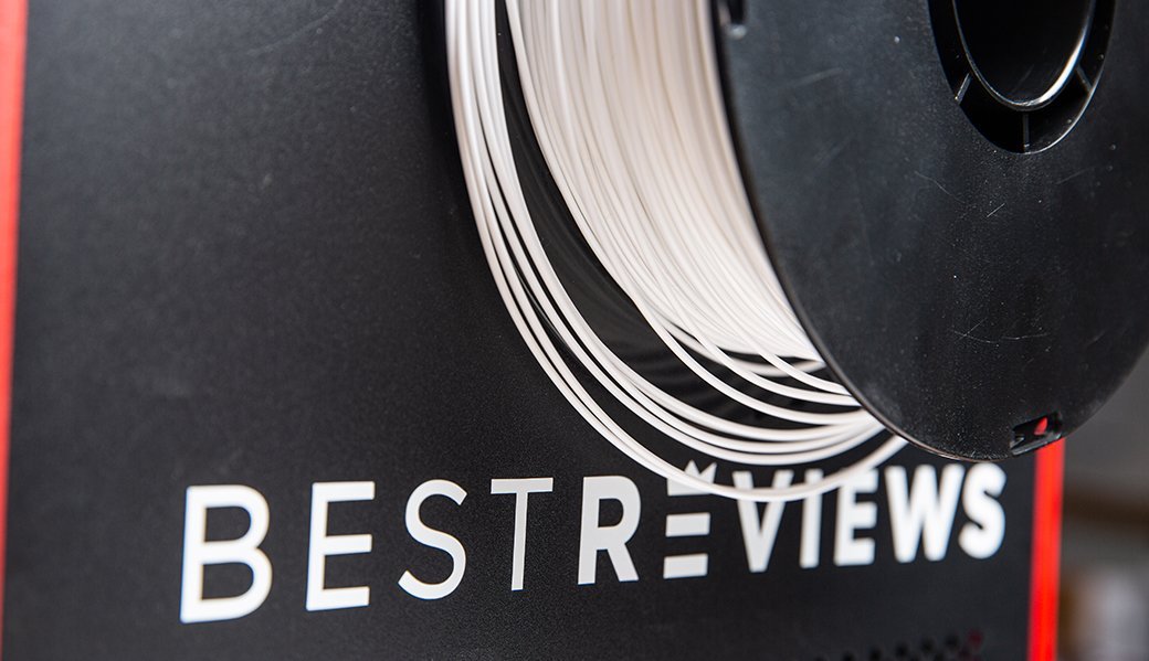 A spool of white 3D printer filament.