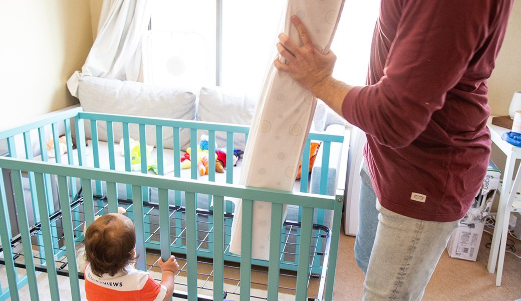 2 mattresses in crib