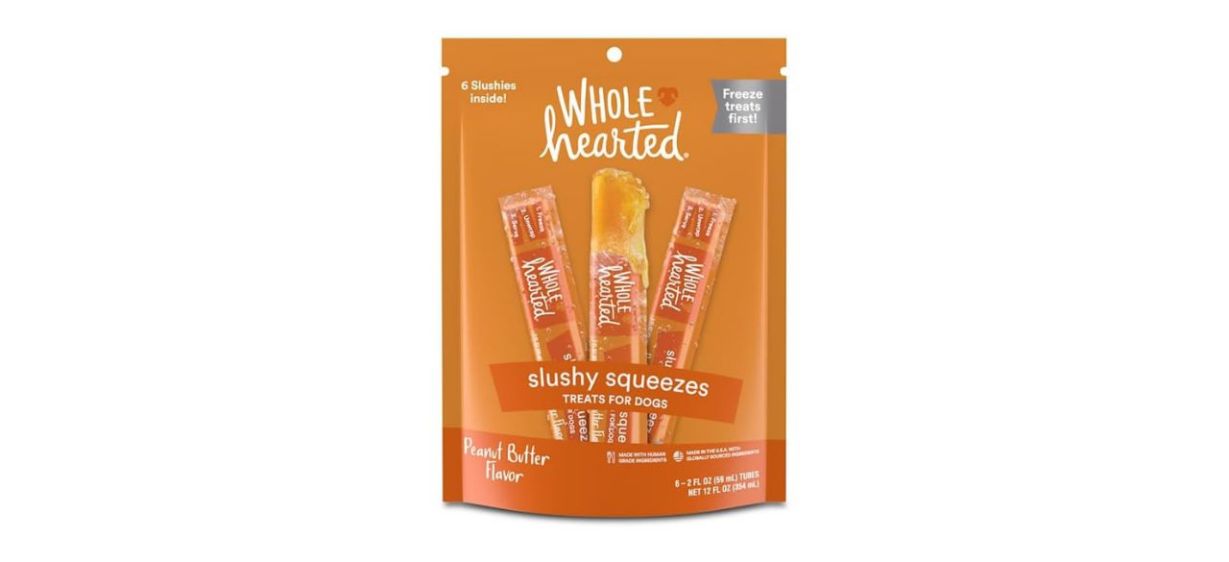 an orange bag with a picture of three frozen peanut butter dog treats in tubes