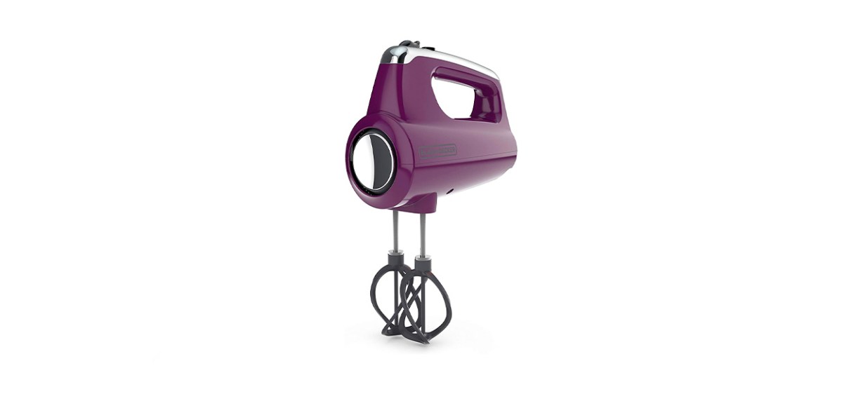 A plum purple hand mixer with black mixing things on the bottom