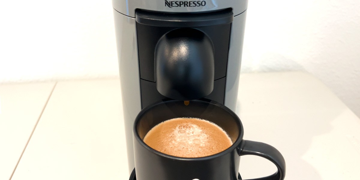 Closeup of coffee in cup on Nespresso VertuoPlus Coffee and Espresso Machine