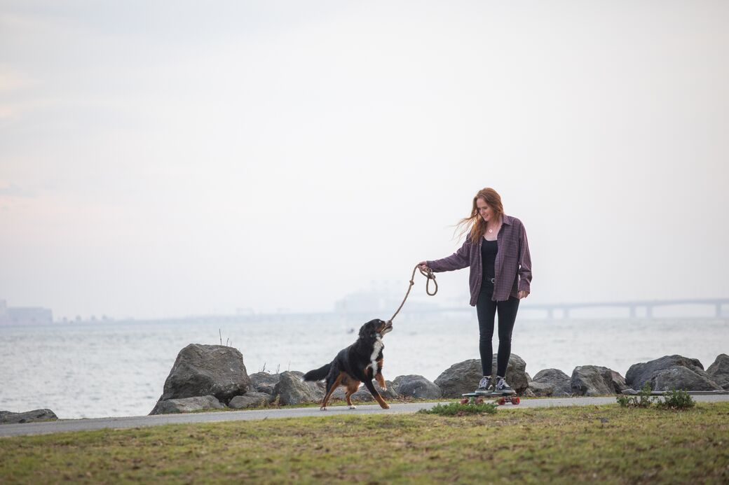 Skateboarder with dog