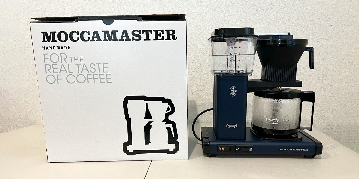 Technivorm Moccamaster on kitchen counter next to product packaging