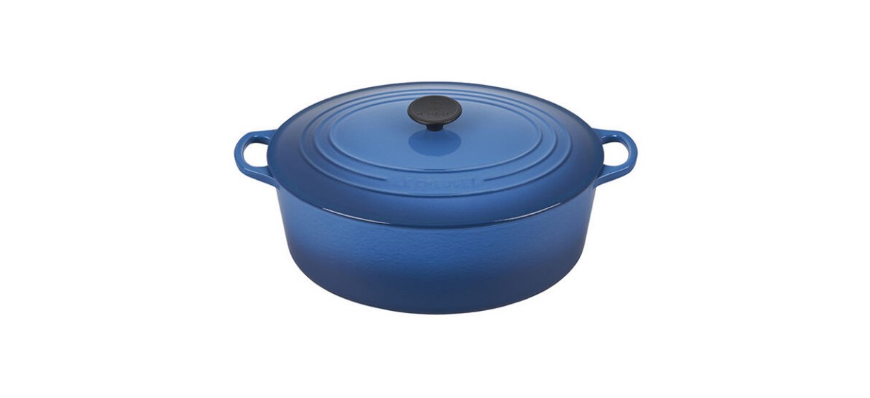 Blue Le Creuset Traditional Oval Dutch Oven on white background