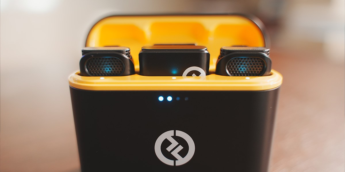 Closeup of Hollyland Lark M1 in charging case on table