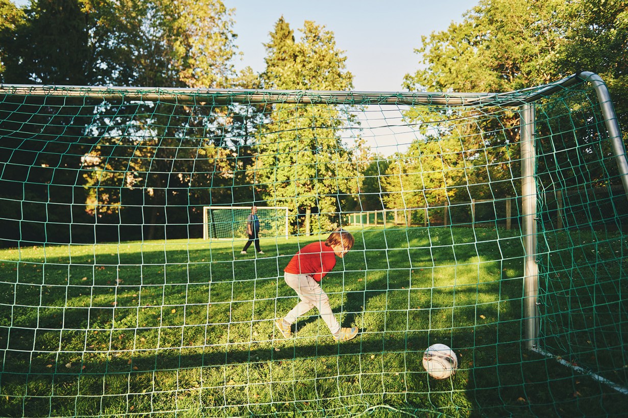 a child playing soccer