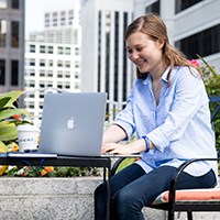 a woman using a laptop